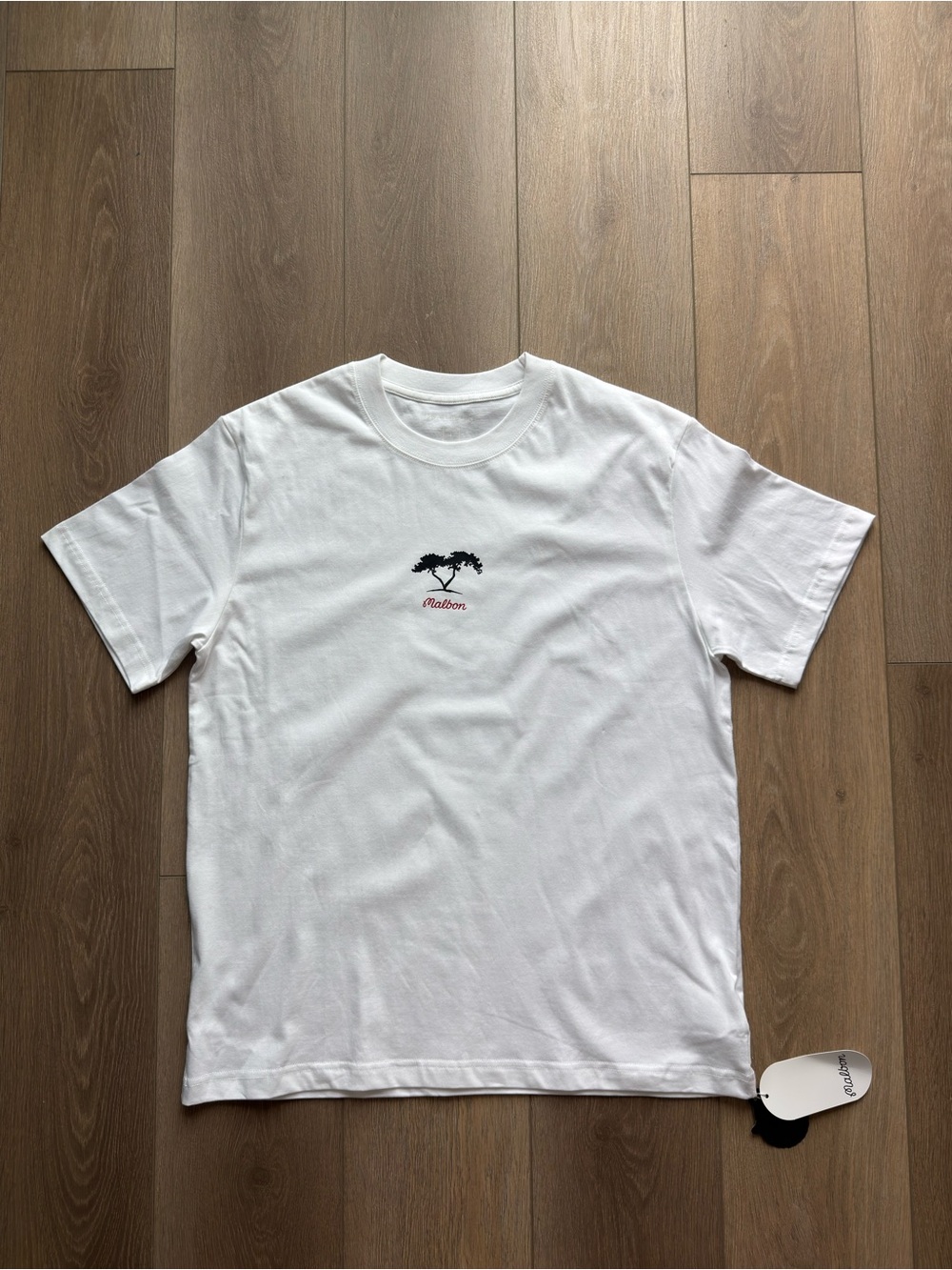 Malbon White Short-Sleeve Men’s Tee with Small Black Palm Graphic